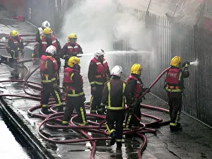 Garages: Firefighters attend fire at bus garage