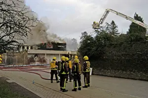 Isleworth: Firefighters in breathing apparatus