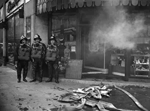 Waterproofs: Firefighters in breathing apparatus, Oxford Street, London