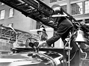 Adjust: Two firefighters with fire engine
