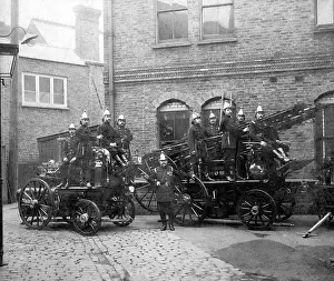 Firefighters with two fire engines