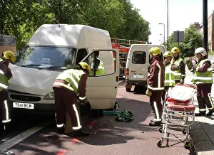 Paramedics: Firefighters inspecting a broken down Ford transit van