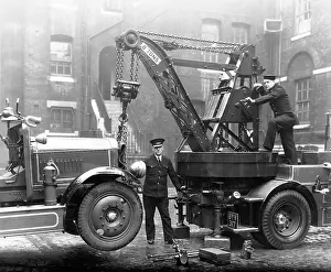 Slung: Firefighters operating a Dennis breakdown lorry