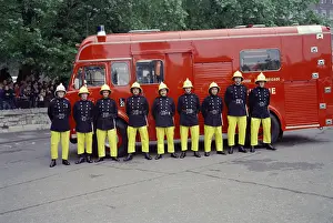 Firefighters on parade in front of their appliance