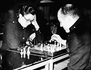 Chessmen: Firefighters playing chess during a break