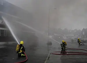 Commerical: Firefighters at scene of commercial premises fire