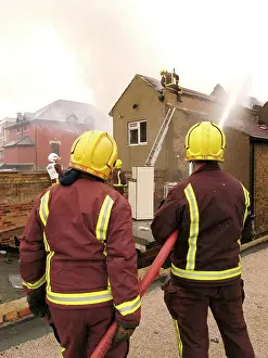 Reflective: Firefighters at the scene of an explosion