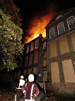 Reflective: Firefighters at the scene of a school fire, SE London