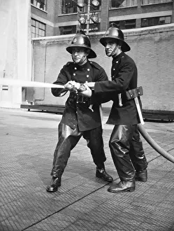 Drills: Firefighters taking part in a hose training drill