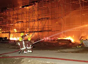 Calypso: Firefighters working at fire on building site
