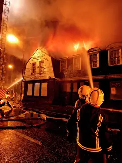 Eltham: Firefighters working at scene of pub fire, SE London