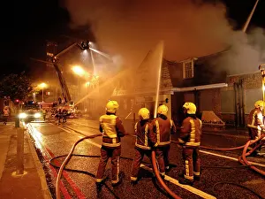 Eltham: Firefighters working at scene of pub fire, SE London