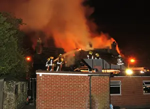 Fiefighters: Firefighters working at scene of restaurant fire