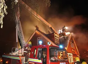 Fiefighters: Firefighters working at scene of restaurant fire