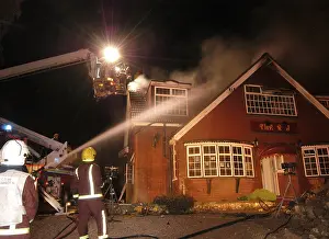Fiefighters: Firefighters working at scene of restaurant fire