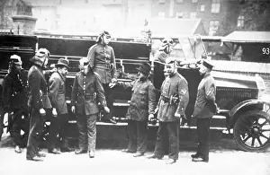 Courts: Firemen arresting two civilians, 1920s
