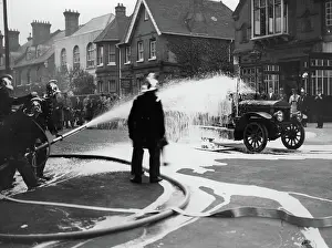 Extinguisher: Firemen testing a new chemical fire