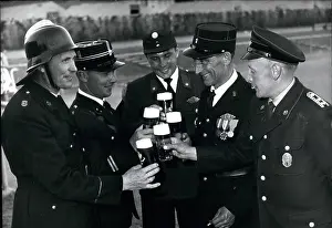 Extinguishing: Firemen from various countries enjoy glasses of beer