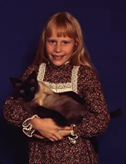 Yang: First daughter Amy Carter with her Siamese cat