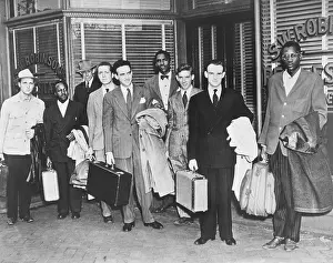Lcgr1409: The first Freedom Riders holding suitcases outside