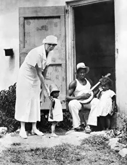 Winn: First Lady Eleanor Roosevelt chatting with ?