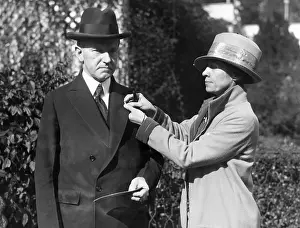 Coolidges: First Lady Grace Coolidge pins a Red Cross ?
