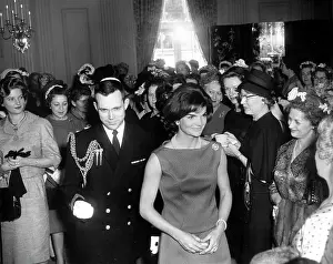 Formalwear: First Lady Jacqueline Kennedy greets guests