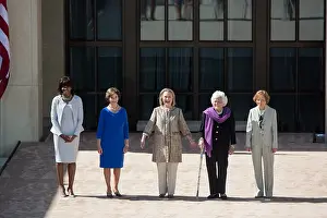 21st Century: First Lady Michelle Obama poses with former First