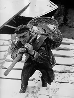 Treptow: Fisherman with captives carps, 1938
