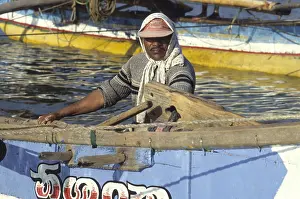 Colombo: Fisherman in headscarf, Sri Lanka