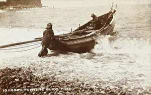 Souwester: Fishermen pushing off from the shore