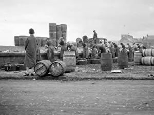 Fishery: Fishery workers on a quayside