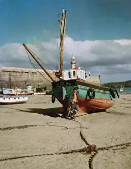 Furled: Fishing boat, Our Pride, on St Ives beach, Cornwall