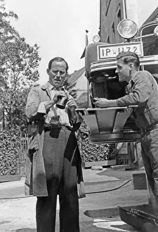 Petrol: Fitters with a damaged bearing, 1935