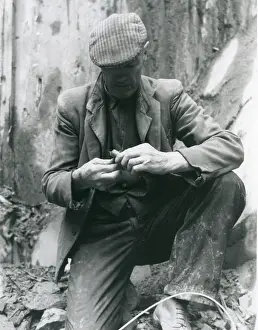 Caernarvonshire: Fixing a detonator, Penyrorsedd Slate Quarry, North Wales