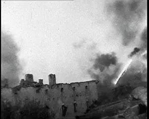 Thrower: A Flame Thrower Being Used Next to a Ruined