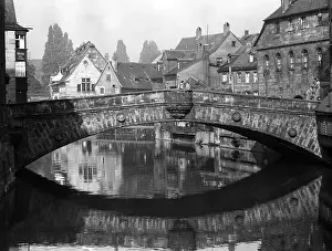Passersby: The Fleischbruecke in Nuremberg