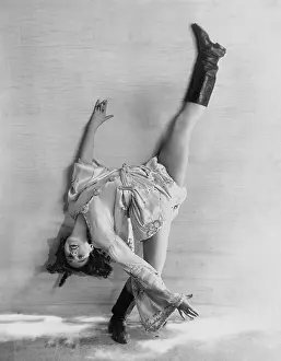 Contortionists: Flexible dancer bending over backwards