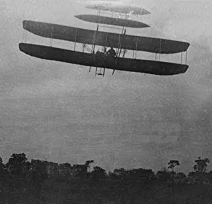 Huffman: Flight 41: Orville flying to the left at a height of about 6