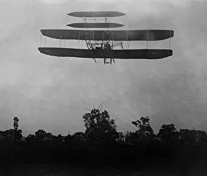 Huffman: Flight 41: Orville flying to the left at a height of about 6