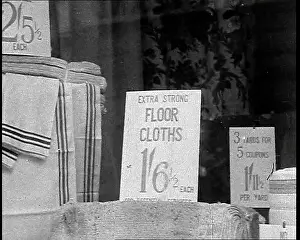 Towels: Floor Cloths and Roller Towels in a Shop Window