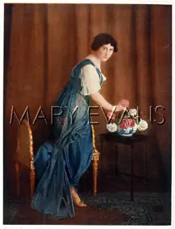 Arranges: FLOWER ARRANGING 1912