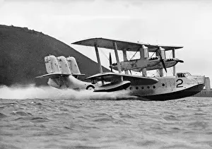 Plymouth: Flying boat at takeoff, 1936