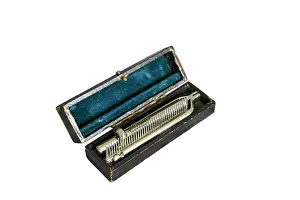 Groomed: Folding beard comb in box