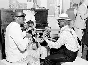 Shafter: Folk Music. Itinerant laborers in blackface ?