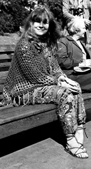 Denny: Folk singer Sandy Denny sitting on a park bench