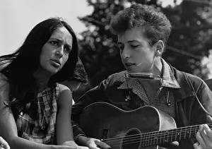 Baez: Folk singers Joan Baez and Bob Dylan singing ?