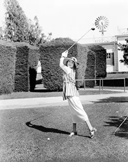 Topiary: Following through on her swing