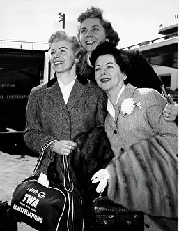 Fontane: The Fontane Sisters standing at the airport