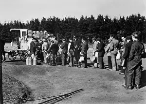 Allocation: Forced laborer queue up for milk, 1942